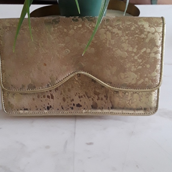 Bellini Handbags - Metallic retro 80s clutch